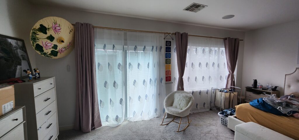 Double Curtains installed after removing a window and installing a sliding glass door